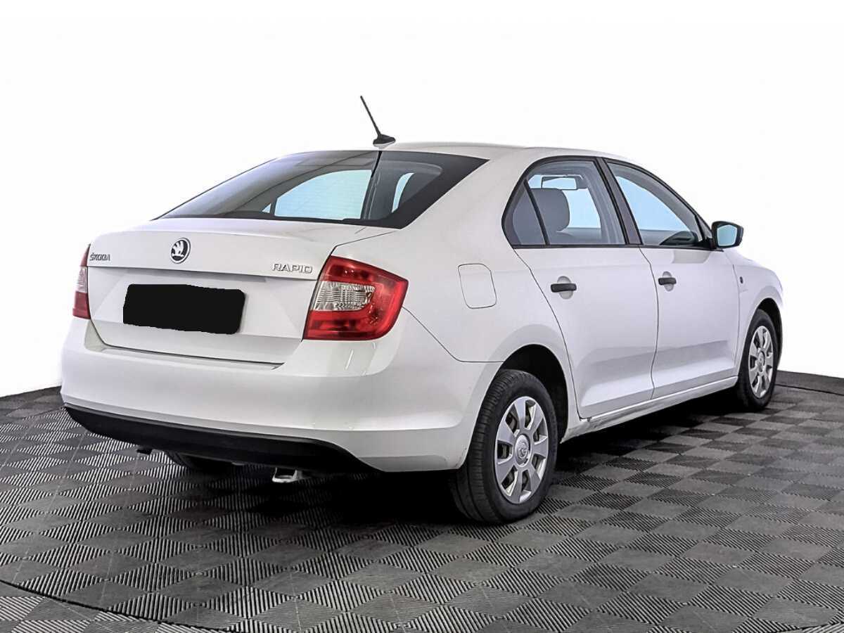 Купить Skoda Rapid с пробегом. Фото: #4