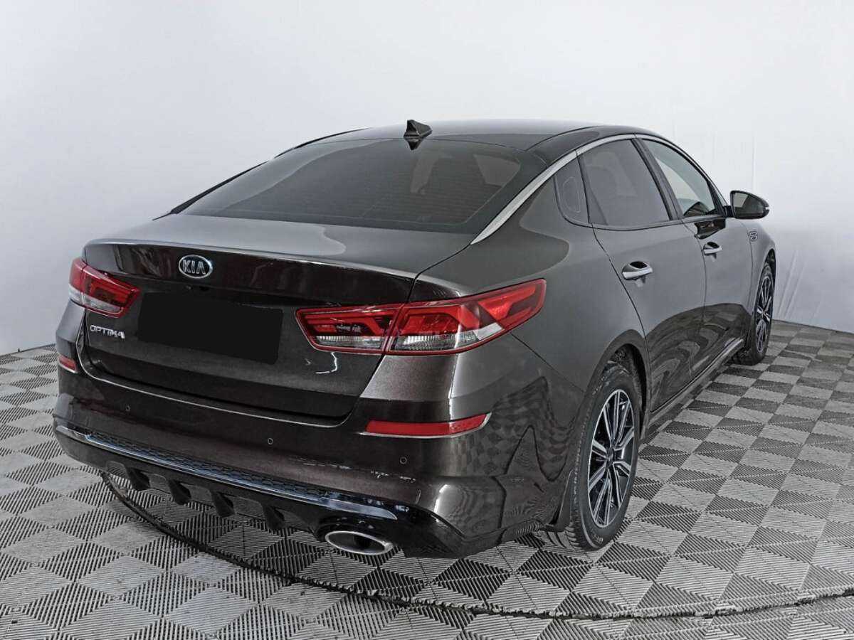 Купить Kia Optima с пробегом. Фото: #4