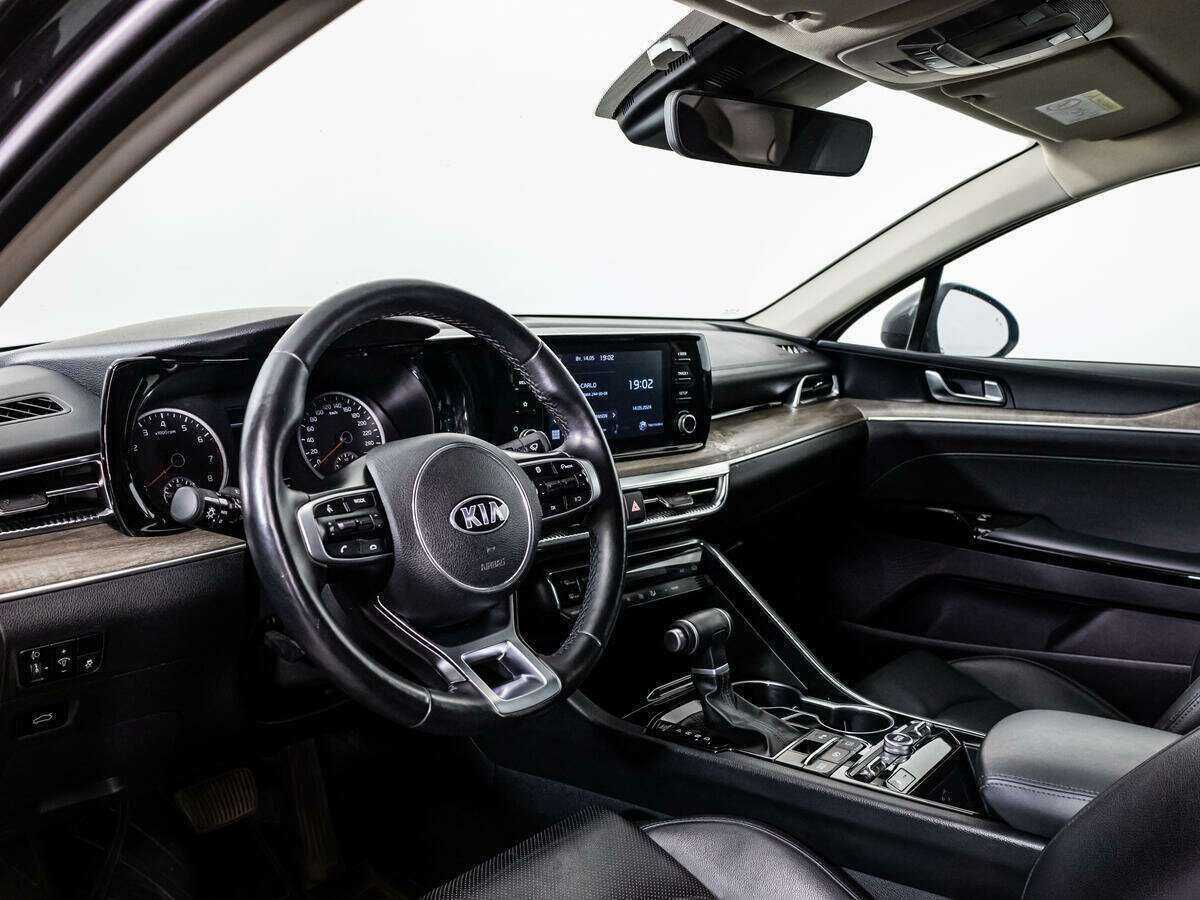 Купить Kia K5 с пробегом. Фото: #9