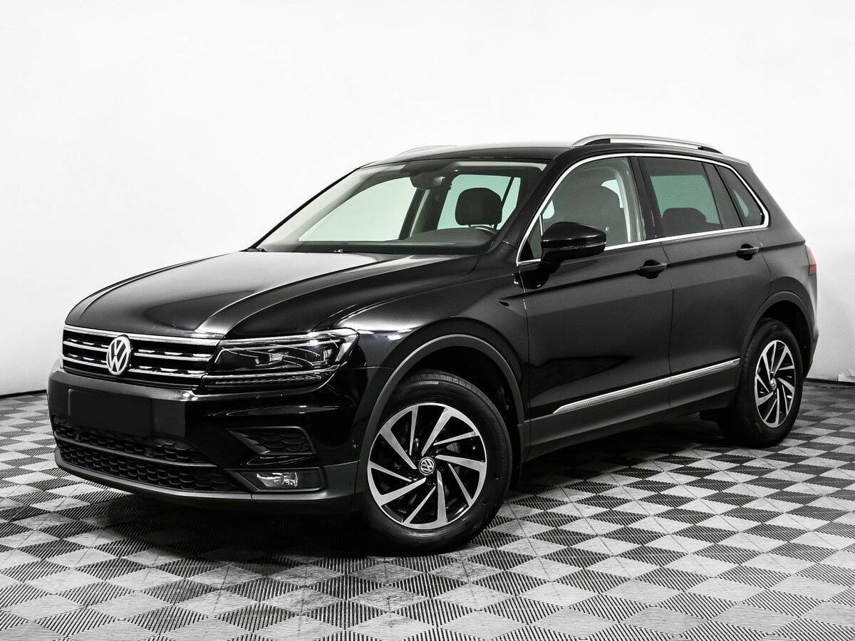 Купить Volkswagen Tiguan с пробегом. Посмотреть фото