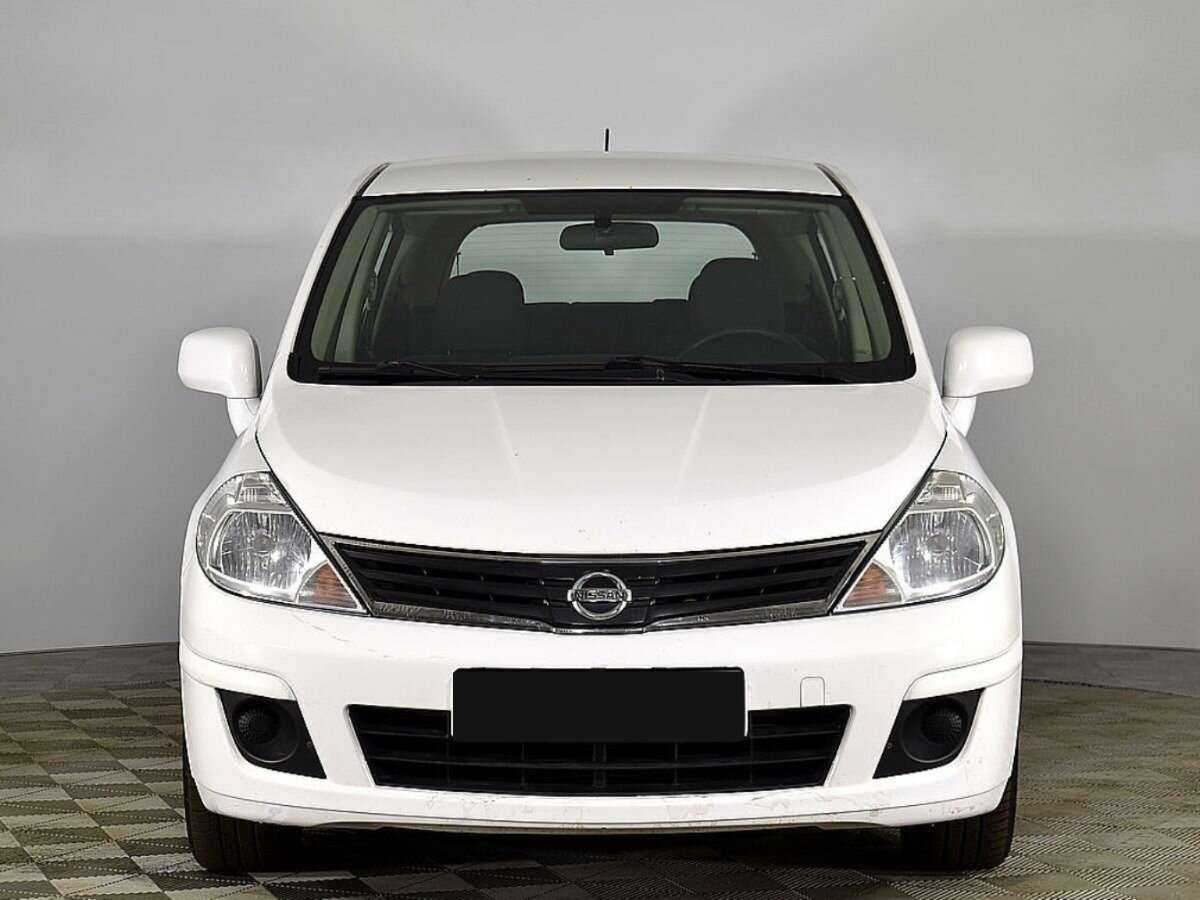 Купить Nissan Tiida с пробегом. Фото: #2