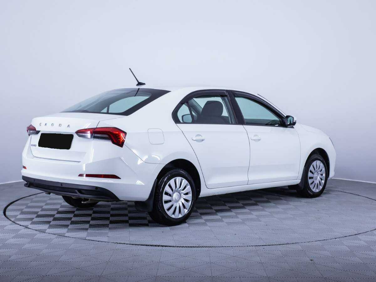 Купить Skoda Rapid с пробегом. Фото: #4