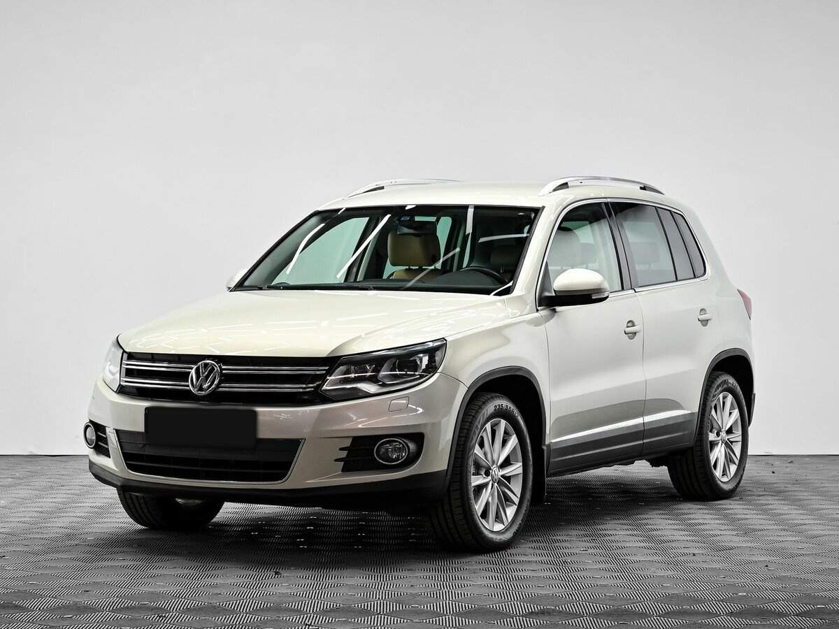 Купить Volkswagen Tiguan с пробегом. Посмотреть фото