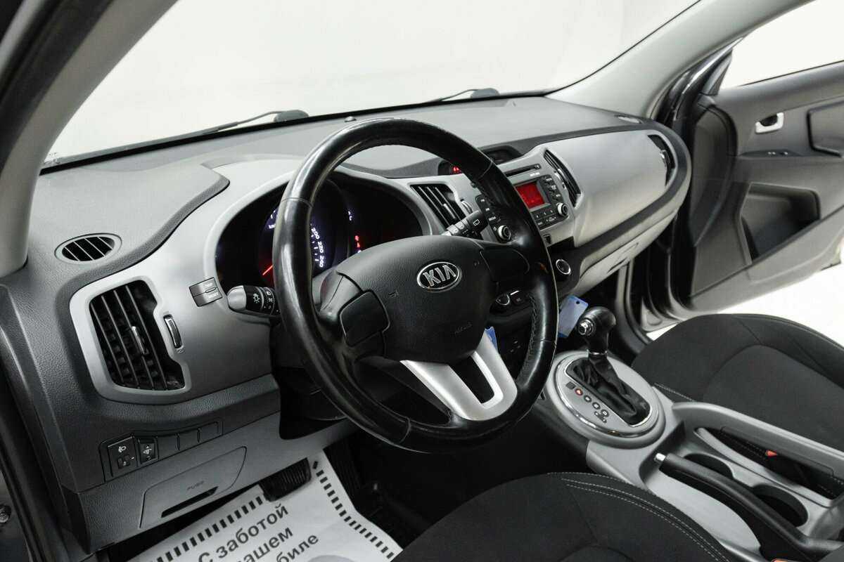 Купить Kia Sportage с пробегом. Фото: #9