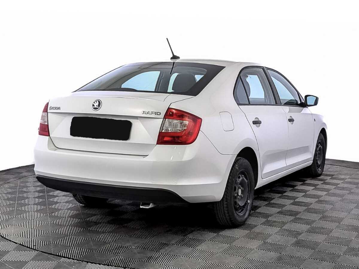 Купить Skoda Rapid с пробегом. Фото: #4