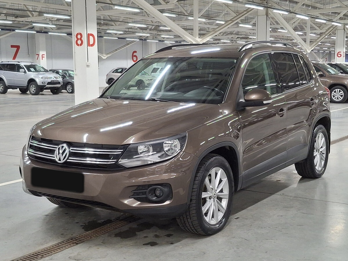 Купить Volkswagen Tiguan с пробегом. Посмотреть фото