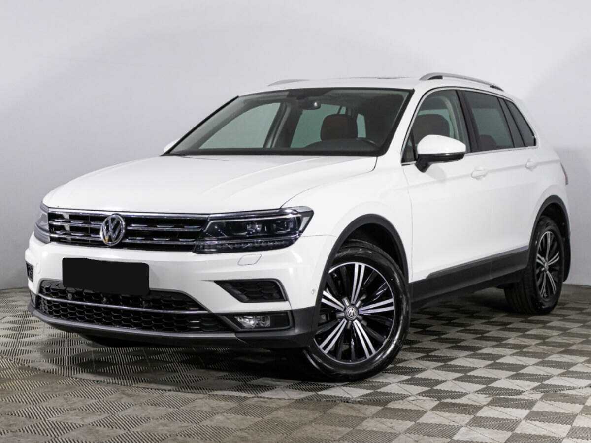 Купить Volkswagen Tiguan с пробегом. Посмотреть фото