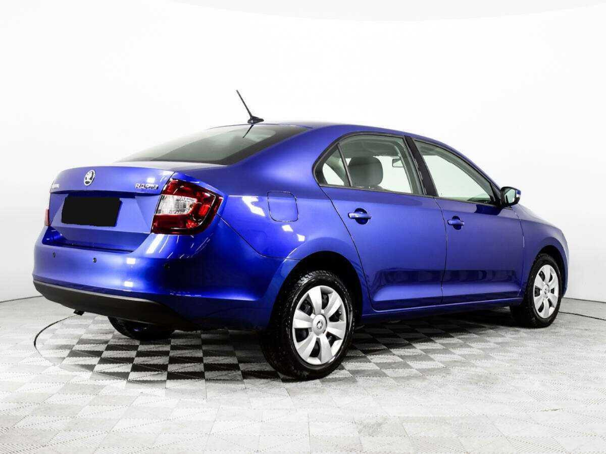Купить Skoda Rapid с пробегом. Фото: #4