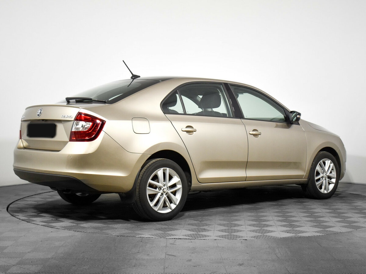 Купить Skoda Rapid с пробегом. Фото: #4