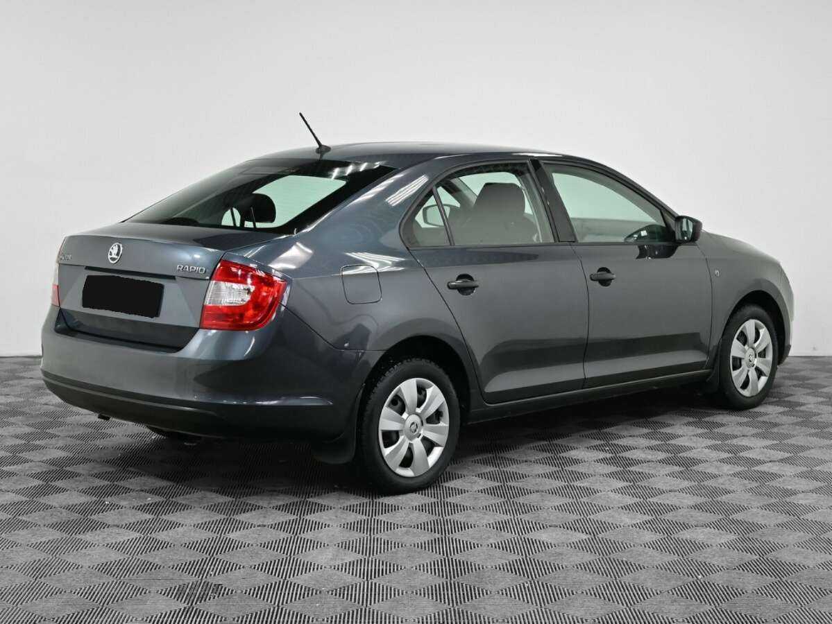 Купить Skoda Rapid с пробегом. Фото: #1