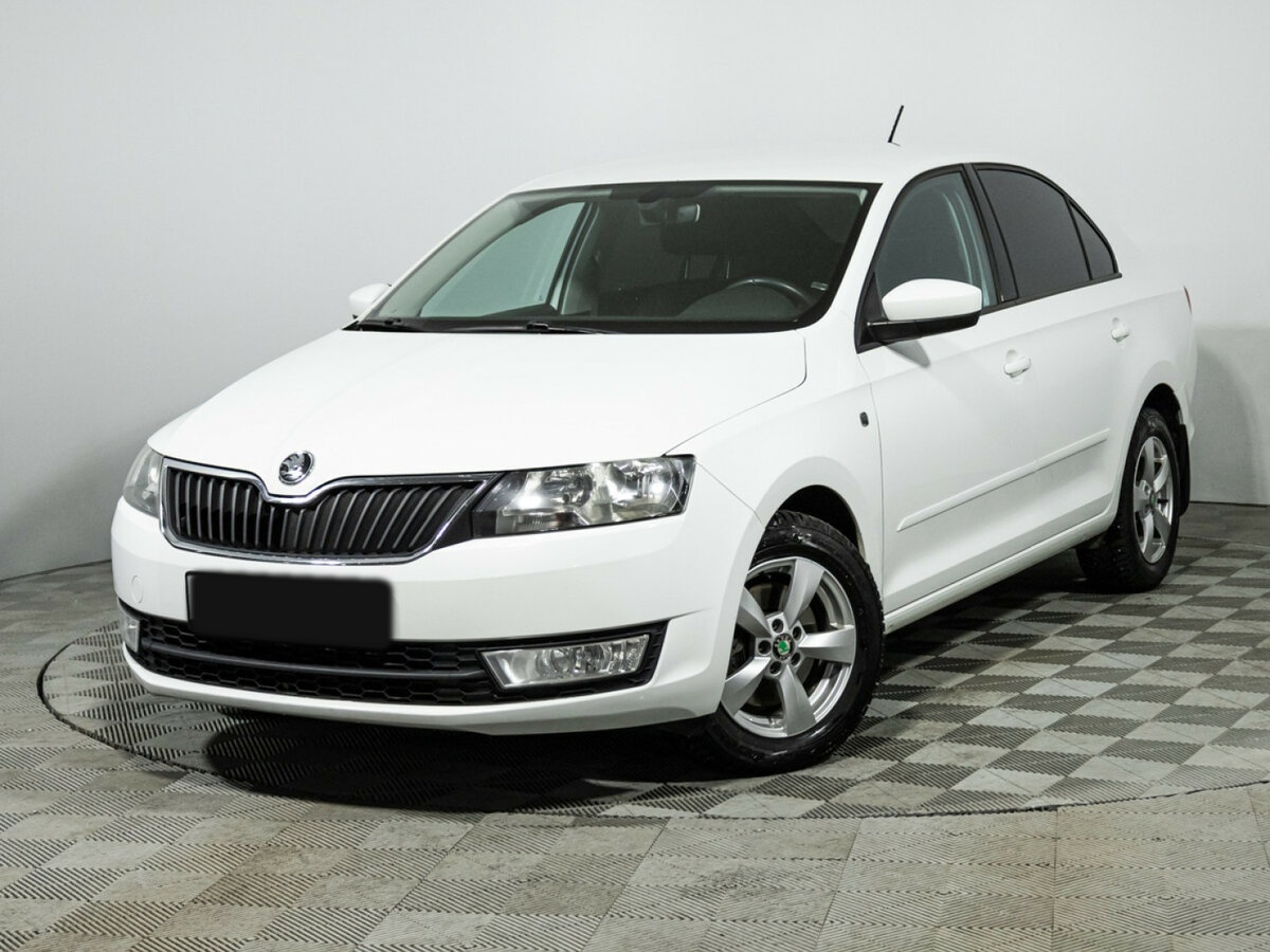 Купить Skoda Rapid с пробегом. Посмотреть фото