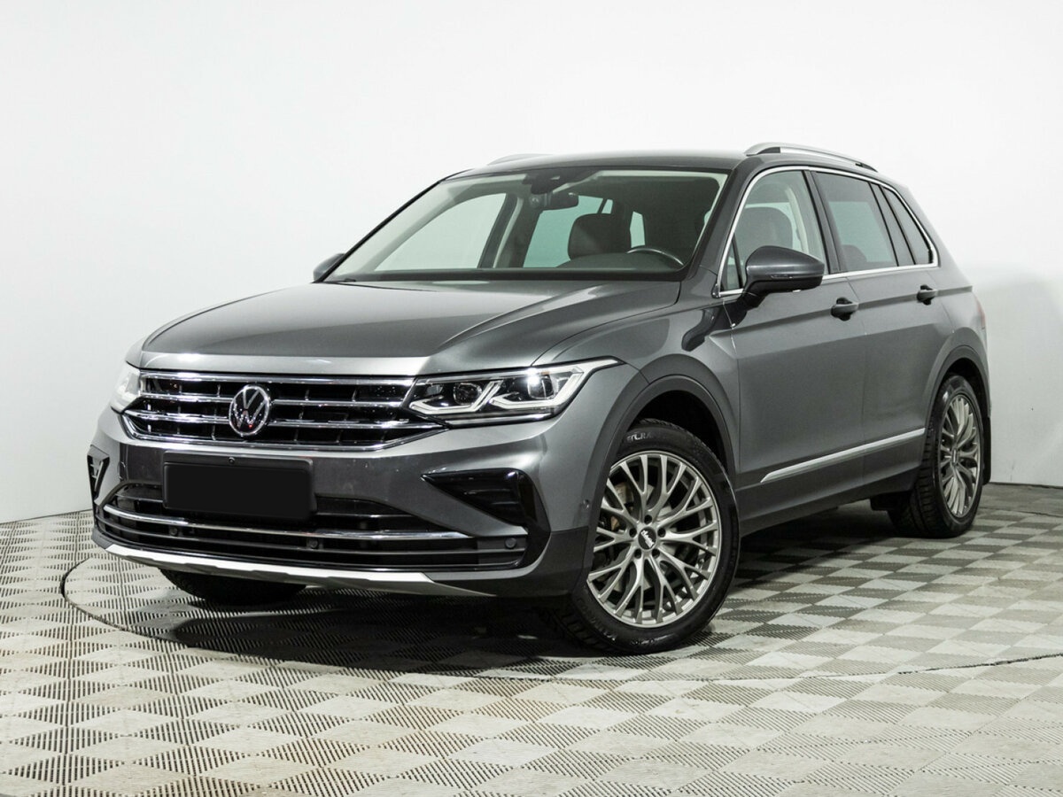 Купить Volkswagen Tiguan с пробегом. Посмотреть фото