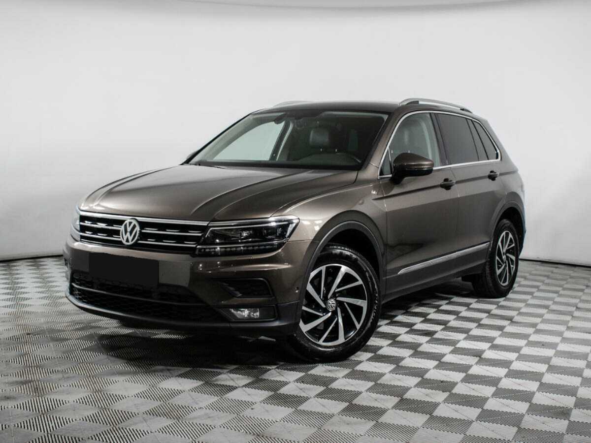 Купить Volkswagen Tiguan с пробегом. Посмотреть фото