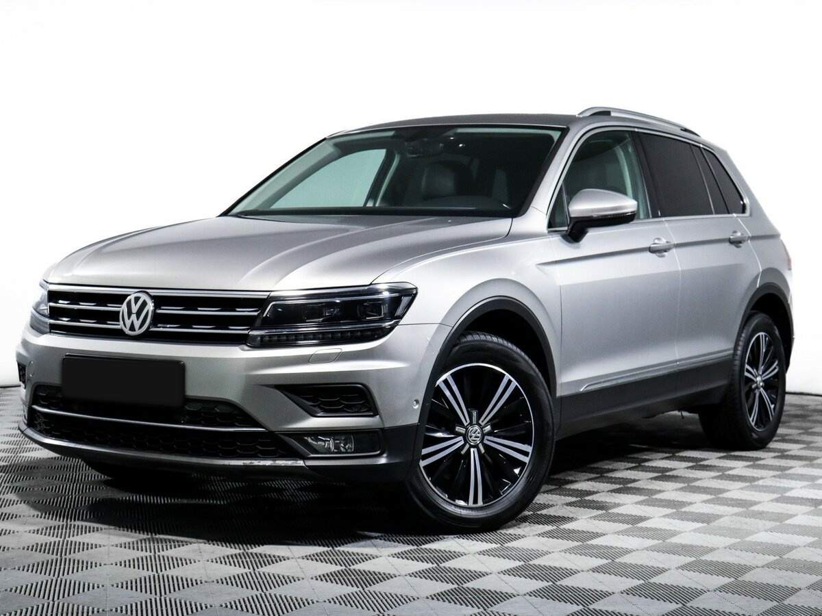 Купить Volkswagen Tiguan с пробегом. Посмотреть фото
