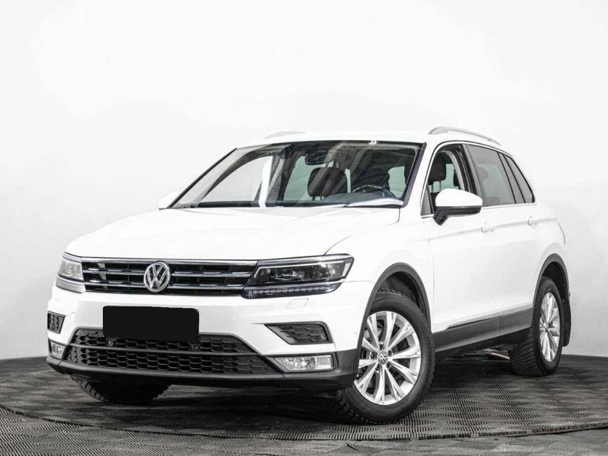 Купить Volkswagen Tiguan с пробегом. Посмотреть фото