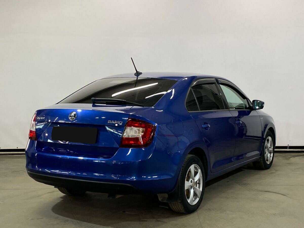 Купить Skoda Rapid с пробегом. Фото: #4