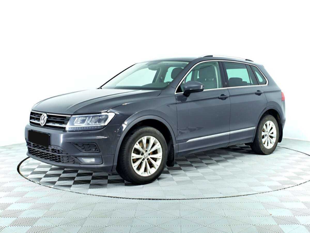 Купить Volkswagen Tiguan с пробегом. Посмотреть фото