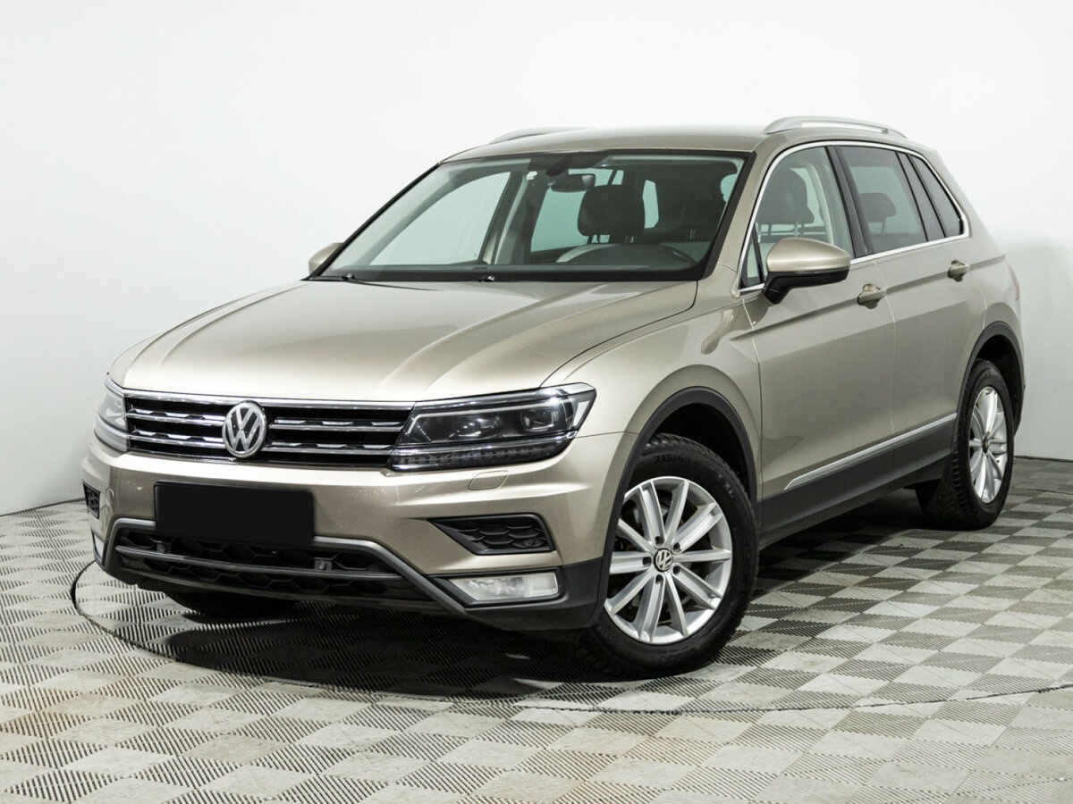 Купить Volkswagen Tiguan с пробегом. Посмотреть фото