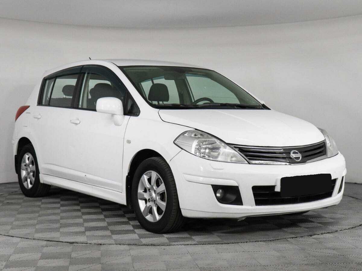 Купить Nissan Tiida с пробегом. Фото: #2