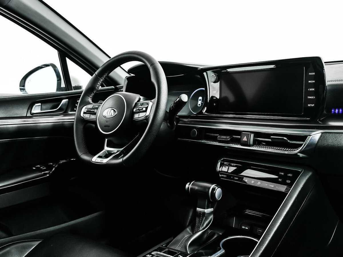 Купить Kia K5 с пробегом. Фото: #8