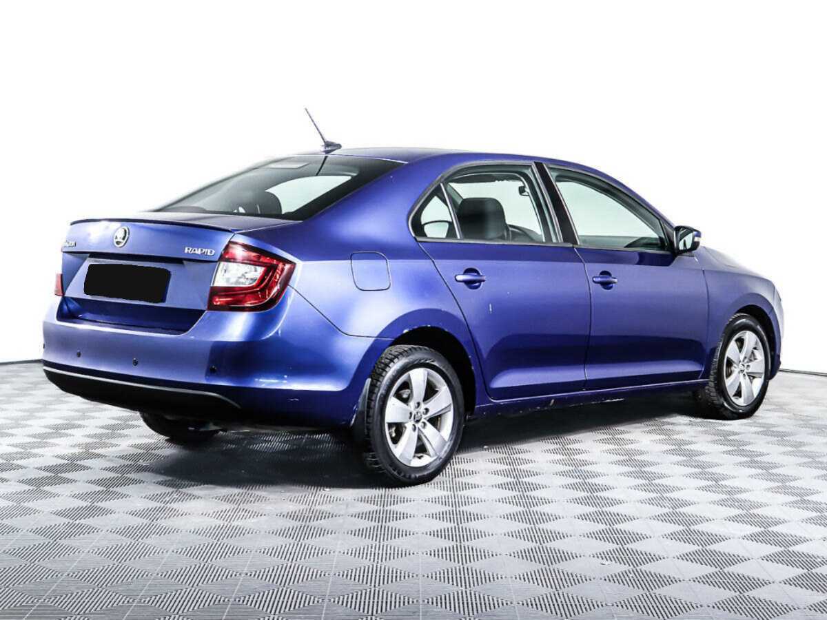 Купить Skoda Rapid с пробегом. Фото: #4