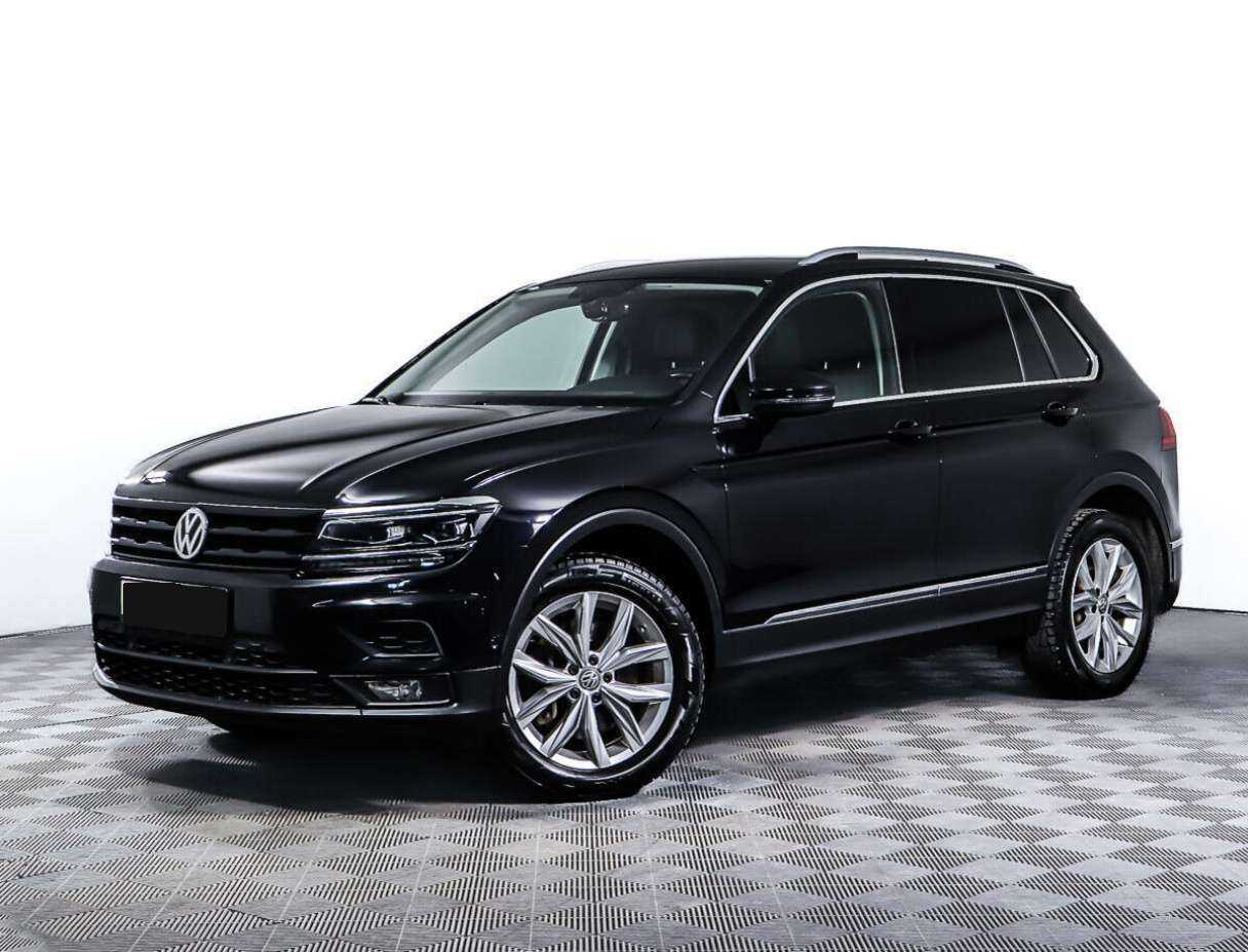 Купить Volkswagen Tiguan с пробегом. Посмотреть фото