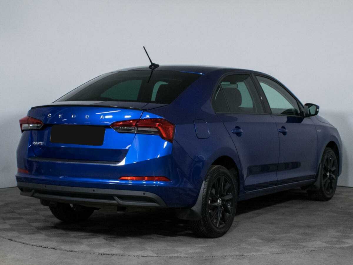 Купить Skoda Rapid с пробегом. Фото: #4
