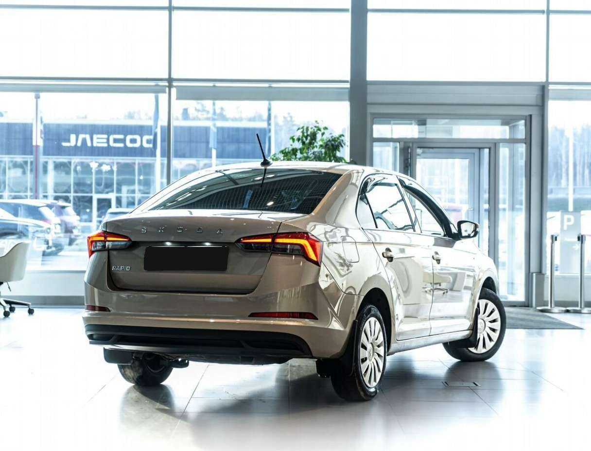 Купить Skoda Rapid с пробегом. Фото: #2