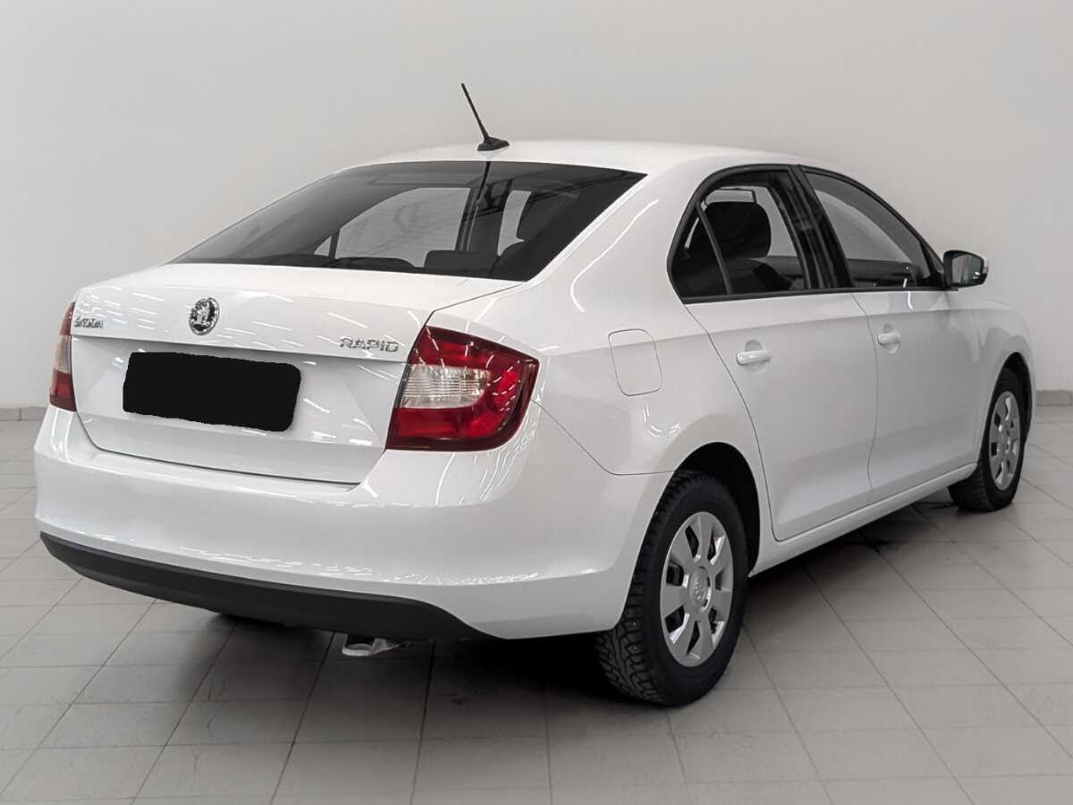 Купить Skoda Rapid с пробегом. Фото: #4