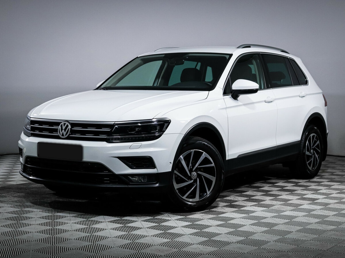 Купить Volkswagen Tiguan с пробегом. Посмотреть фото