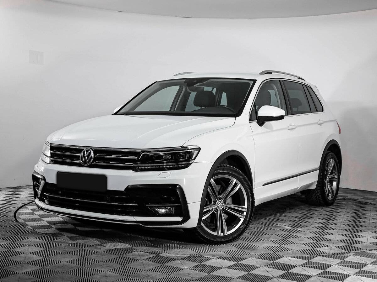 Купить Volkswagen Tiguan с пробегом. Посмотреть фото