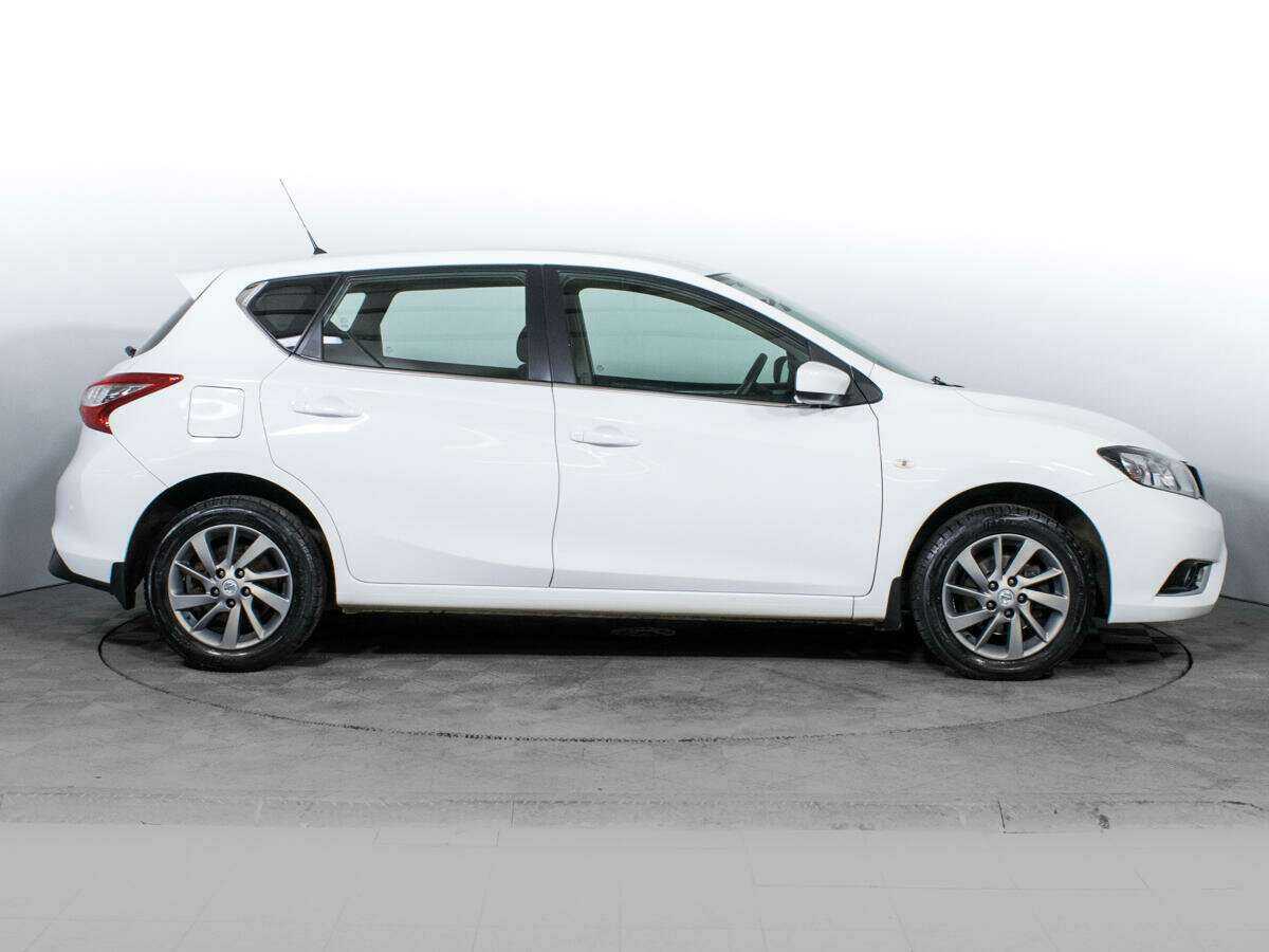 Купить Nissan Tiida с пробегом. Фото: #3