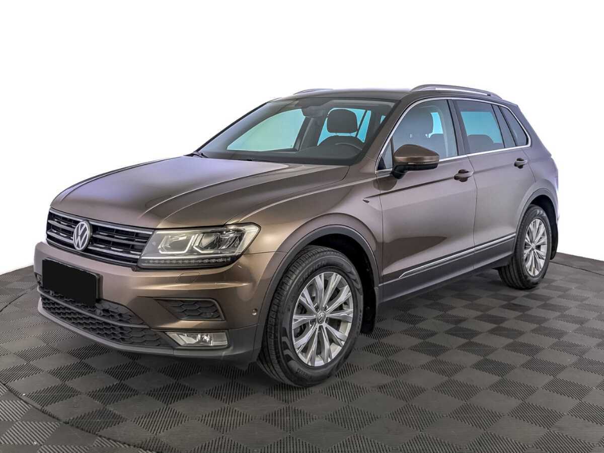 Купить Volkswagen Tiguan с пробегом. Посмотреть фото