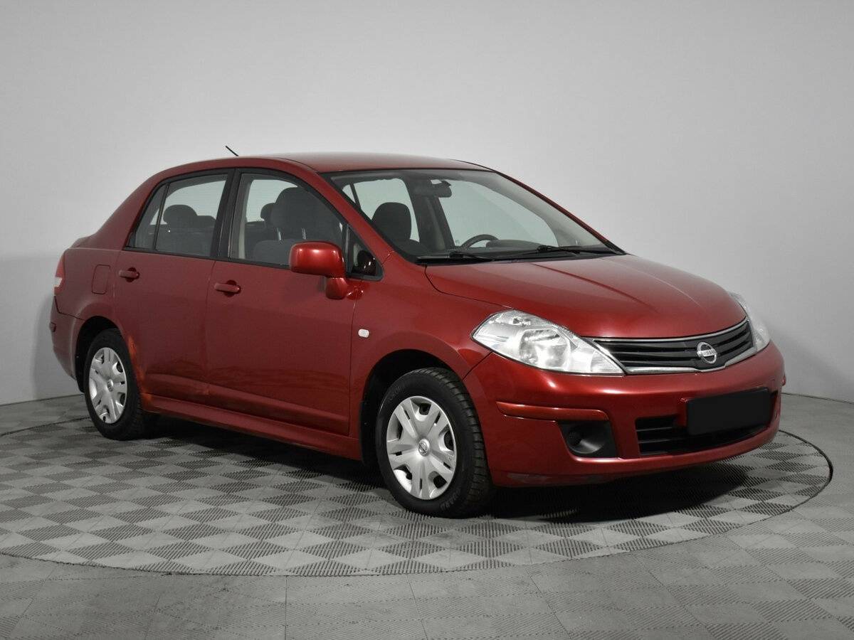 Купить Nissan Tiida с пробегом. Фото: #2
