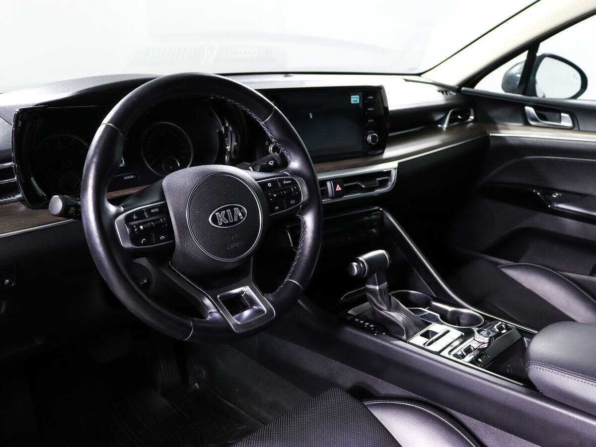 Купить Kia K5 с пробегом. Фото: #11