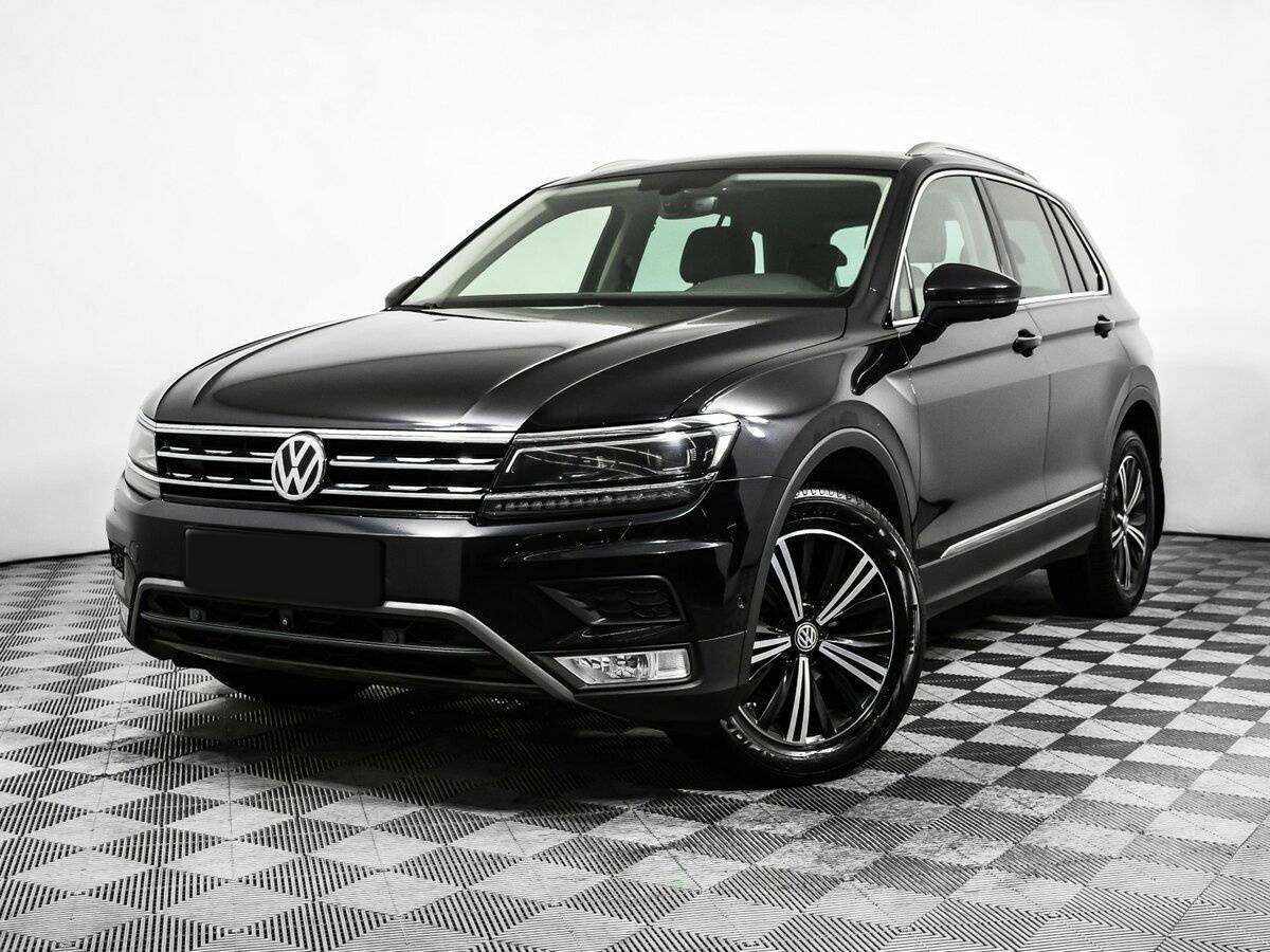 Купить Volkswagen Tiguan с пробегом. Посмотреть фото