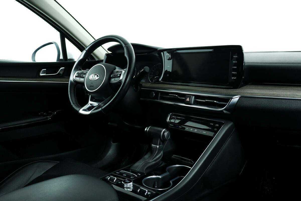 Купить Kia K5 с пробегом. Фото: #7