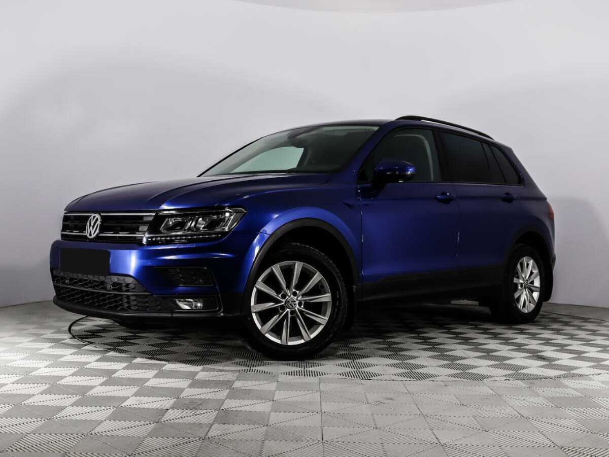 Купить Volkswagen Tiguan с пробегом. Посмотреть фото