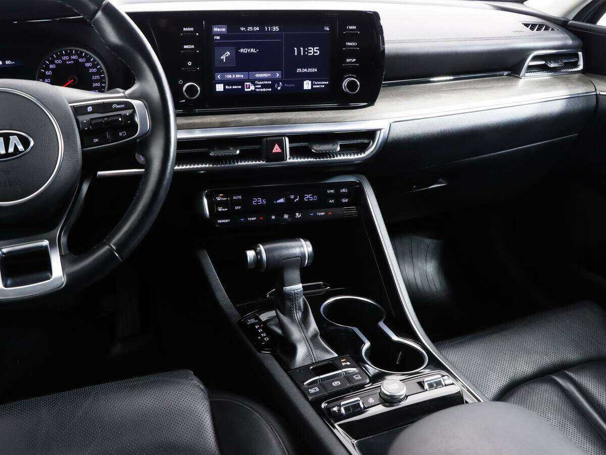 Купить Kia K5 с пробегом. Фото: #11