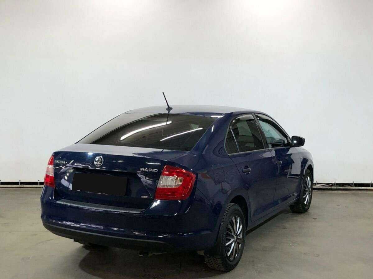 Купить Skoda Rapid с пробегом. Фото: #4