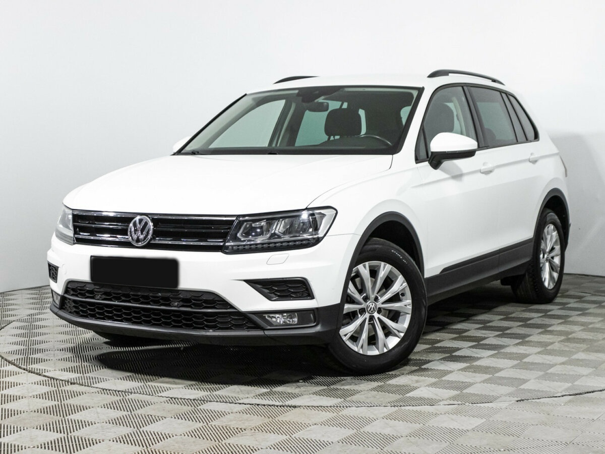 Купить Volkswagen Tiguan с пробегом. Посмотреть фото