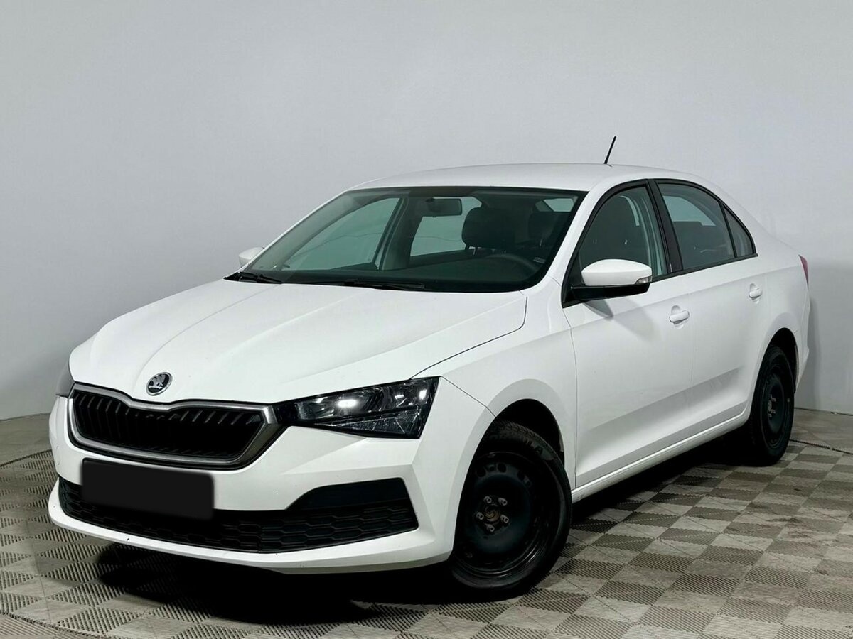 Купить Skoda Rapid с пробегом. Посмотреть фото