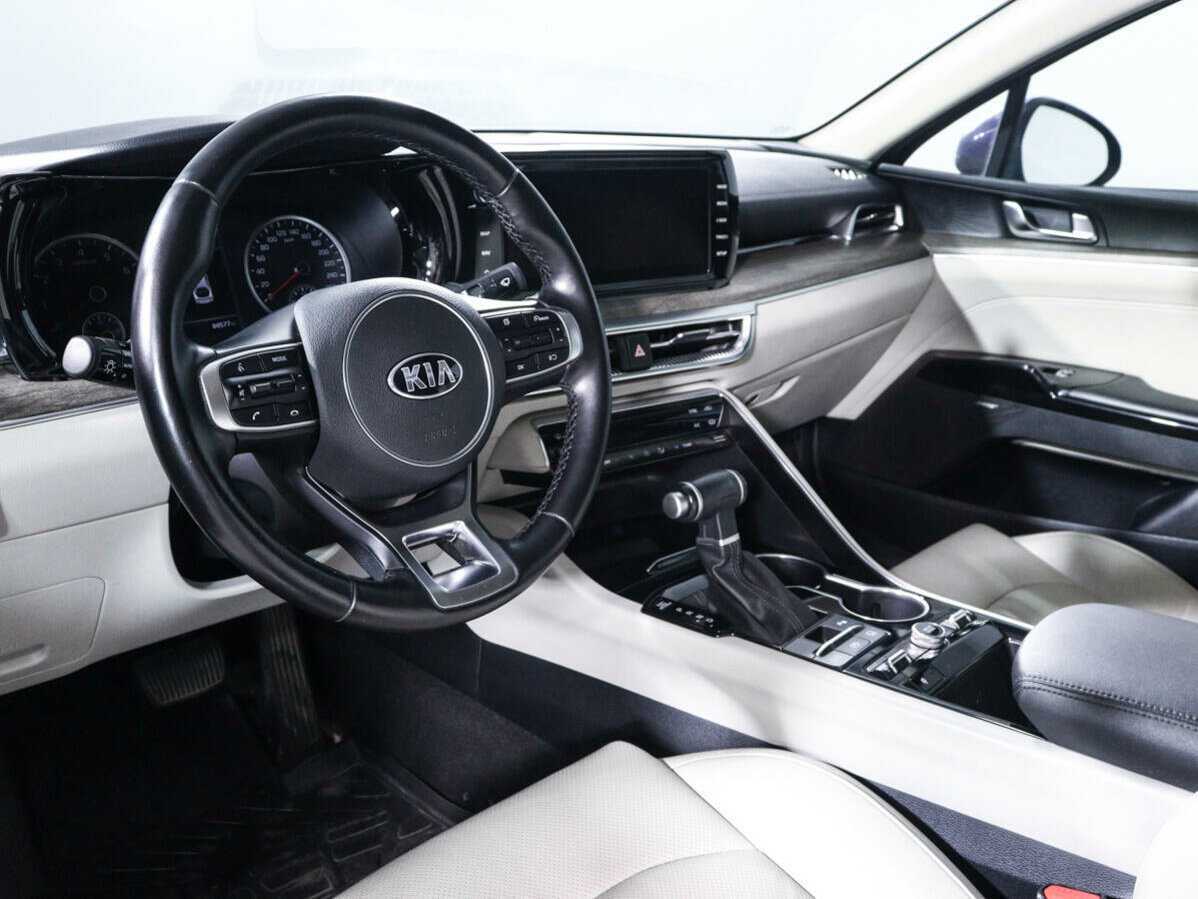 Купить Kia K5 с пробегом. Фото: #11