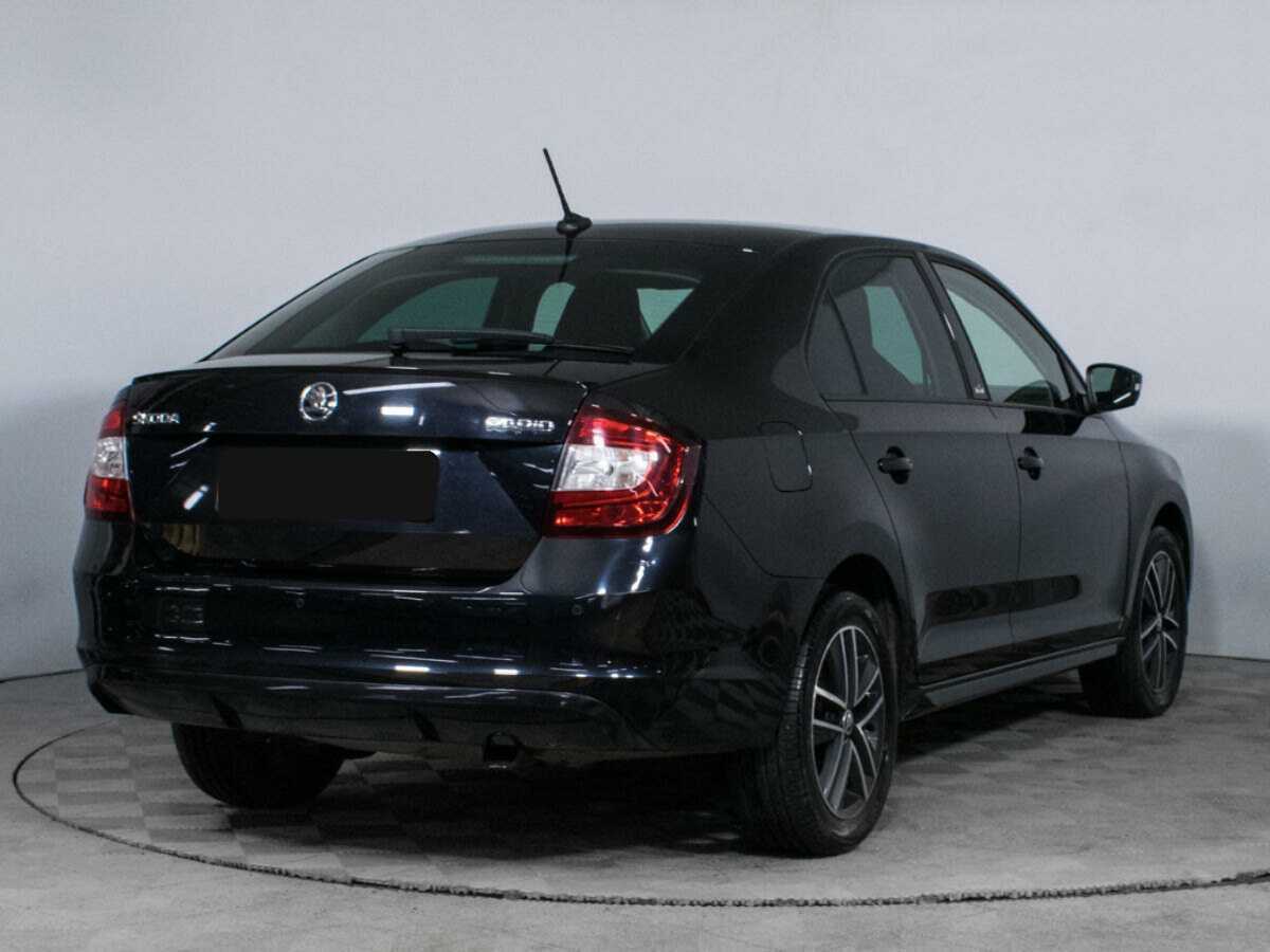 Купить Skoda Rapid с пробегом. Фото: #4