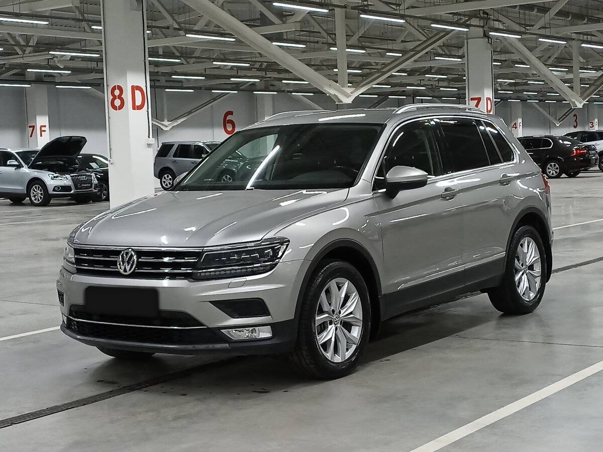 Купить Volkswagen Tiguan с пробегом. Посмотреть фото