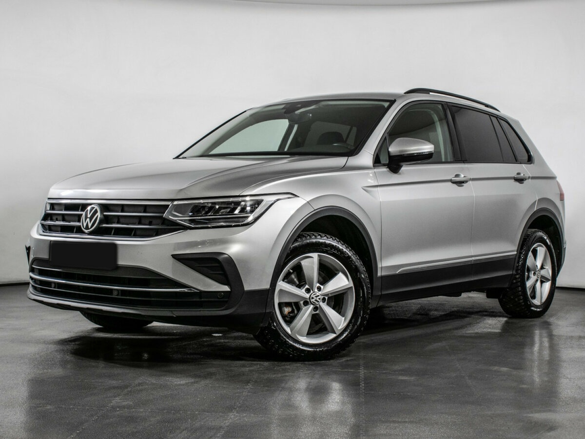 Купить Volkswagen Tiguan с пробегом. Посмотреть фото