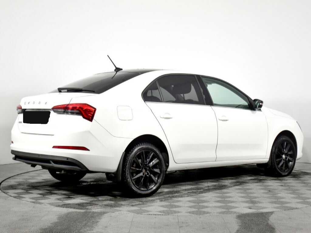 Купить Skoda Rapid с пробегом. Фото: #4