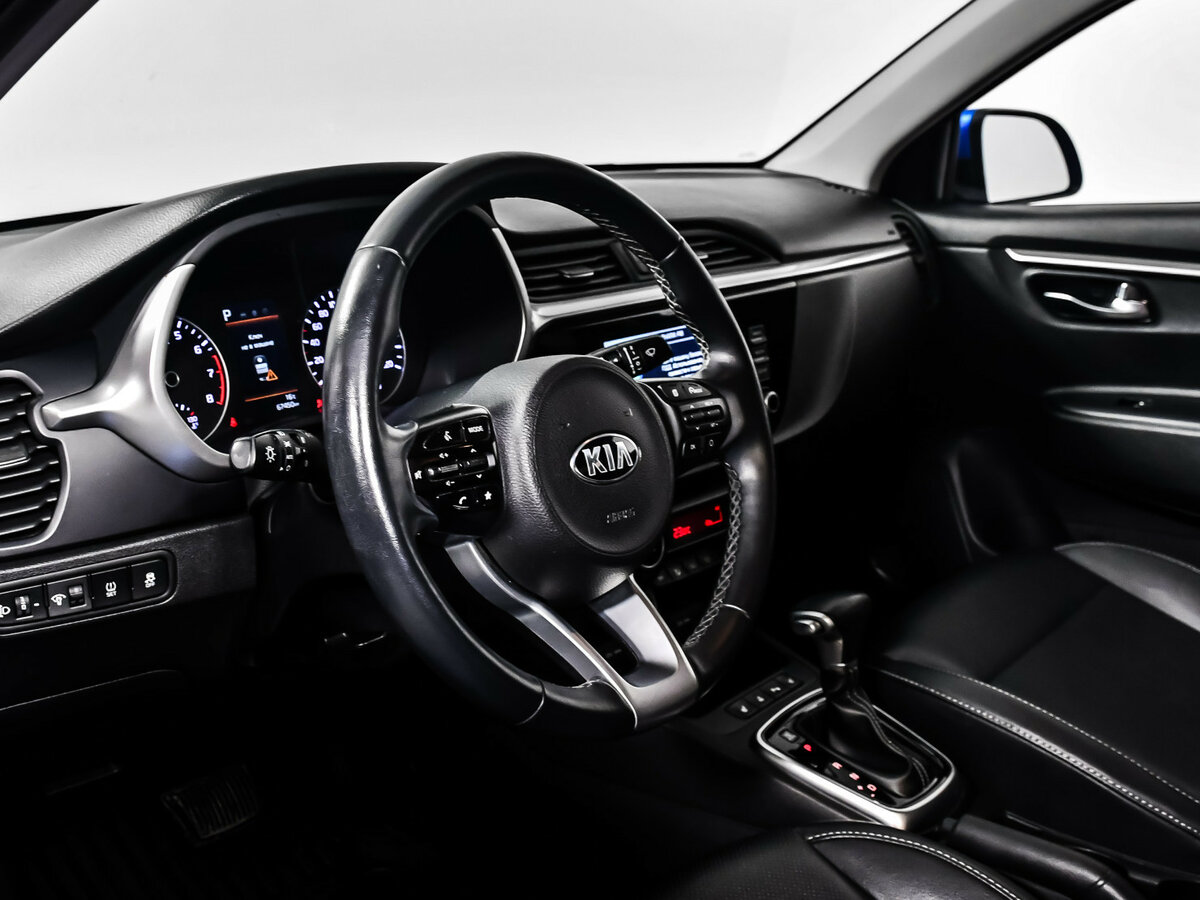 Купить Kia Rio с пробегом. Фото: #9