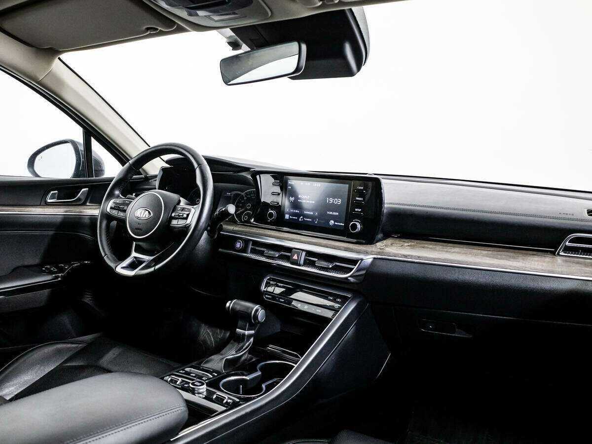 Купить Kia K5 с пробегом. Фото: #7