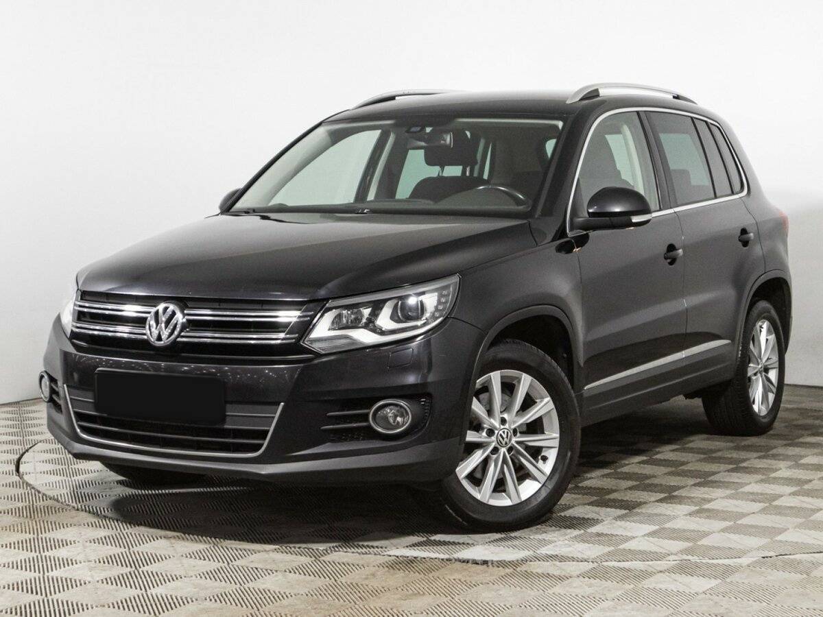 Купить Volkswagen Tiguan с пробегом. Посмотреть фото